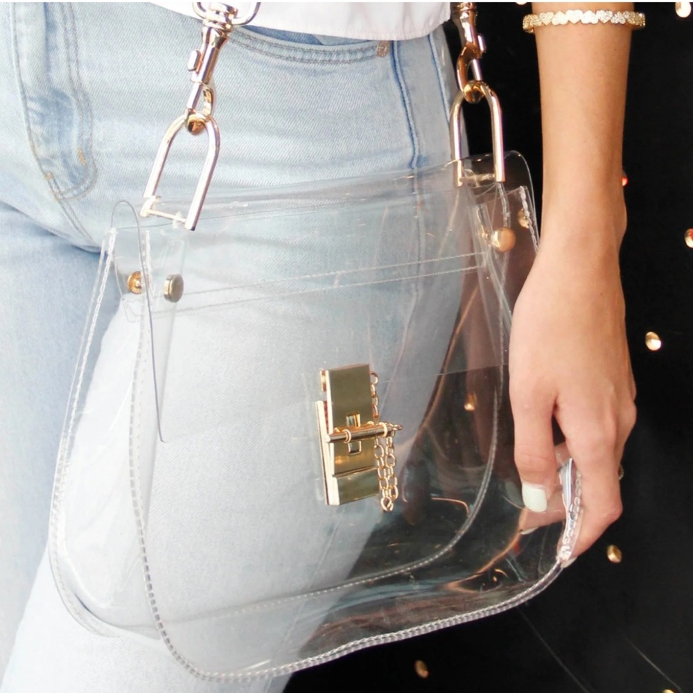 Clearly Handbag with gold chain strap and wide camo strap